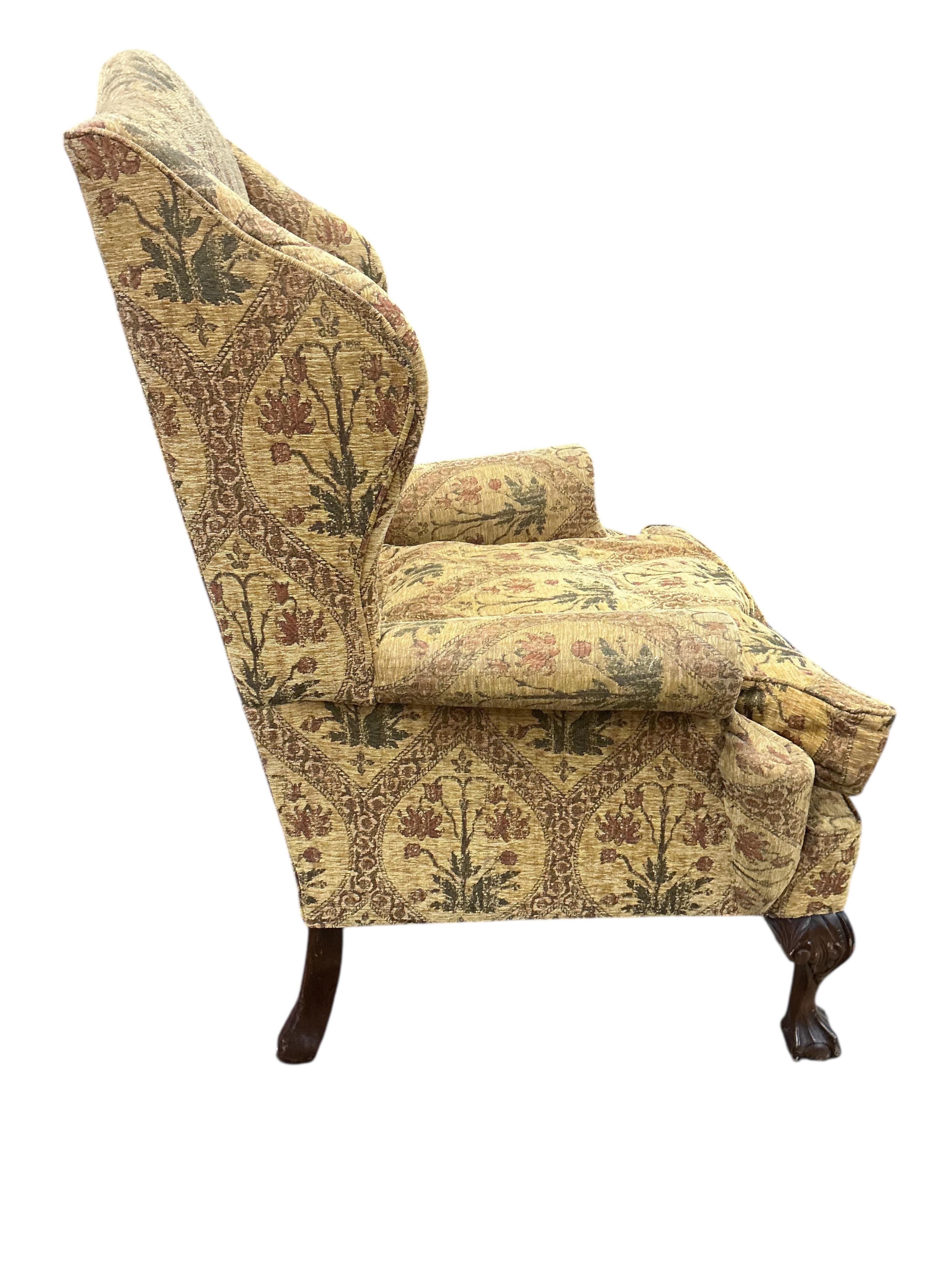 A pair of George III style upholstered wing armchairs, width 86cm, depth 74cm, height 120cm